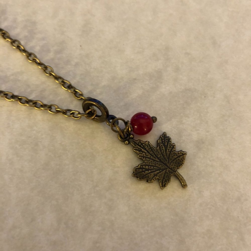NEW Brass Maple Leaf with a genuine Ruby gemstone